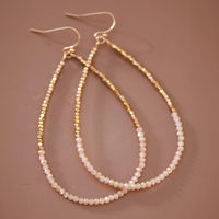 Gold beaded hollow drop earrings with glass beads