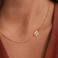 Gold and silver stainless steel initial necklaces