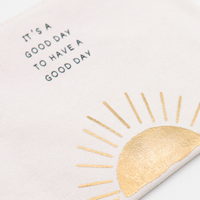 Cream canvas pouch with It's a Good Day to Have a Good Day saying