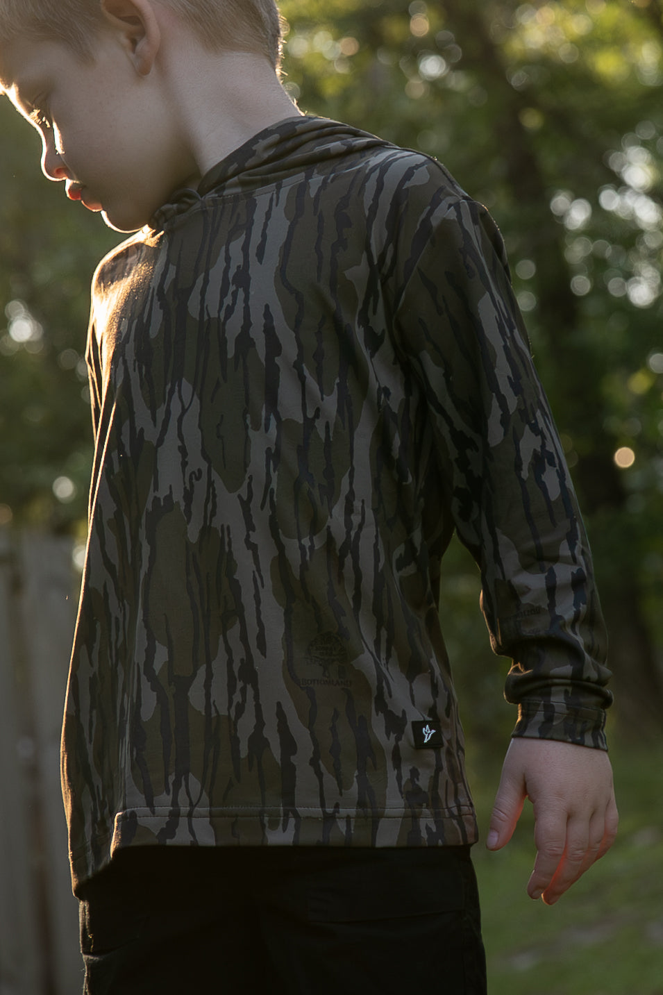 Combat Waterfowl Youth Hooded Performance Shirt Mossy Oak Bottomland view 1