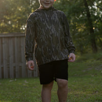 Combat Waterfowl Youth Hooded Performance Shirt Mossy Oak Bottomland view 2