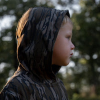 Combat Waterfowl Youth Hooded Performance Shirt Mossy Oak Bottomland view 3