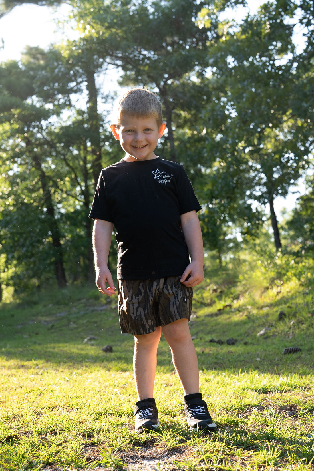 Combat Waterfowl 5.5 inch Youth Volley Short with Belt Loops in Mossy Oak Bottomland