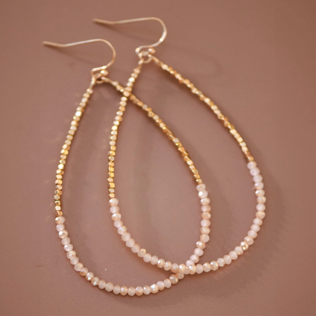 Gold beaded hollow drop earrings with glass beads