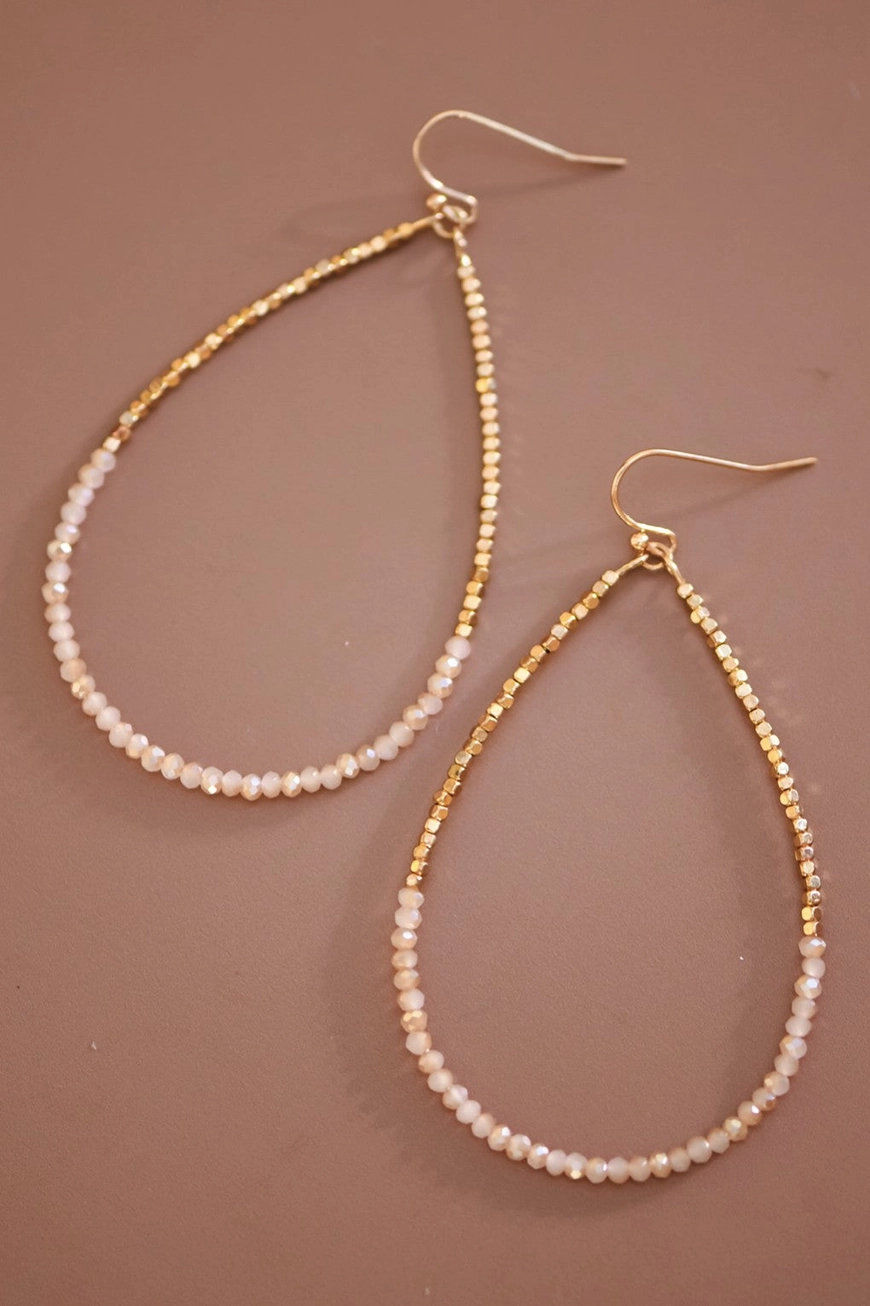 Gold beaded teardrop earrings with glass beads