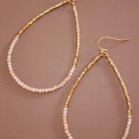 Gold beaded teardrop earrings with glass beads