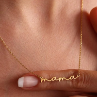 Gold mama necklace close-up