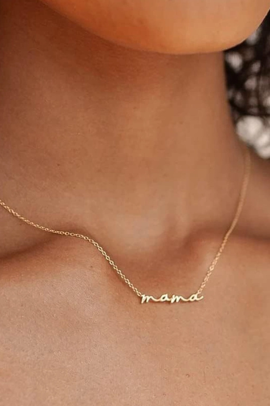 Mama script necklace shown on model