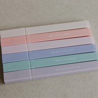 Motivational messages printed on neutral pastel highlighters